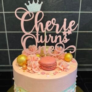 Birthday cake topper with a crown