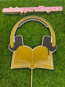 Headset and book cake topper